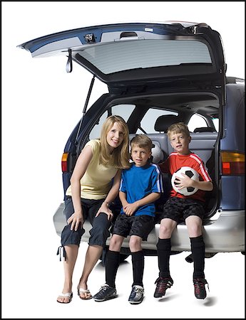 Soccer mom with sons Stock Photo - Premium Royalty-Free, Code: 640-02769051