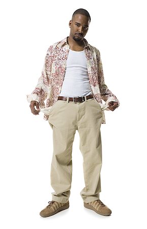 photographic portraits poor people - African American man with pant pockets turned out Stock Photo - Premium Royalty-Free, Code: 640-02769106