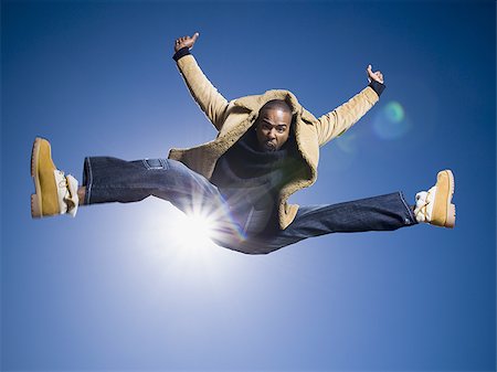 simsearch:640-03255435,k - African American man jumping Stock Photo - Premium Royalty-Free, Code: 640-02769127
