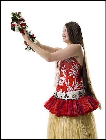 Hawaiian woman with lei Stock Photo - Premium Royalty-Free, Code: 640-02769299