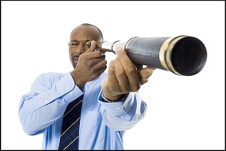 person with telescope - Businessman looking through telescope Stock Photo - Premium Royalty-Free, Code: 640-02769309