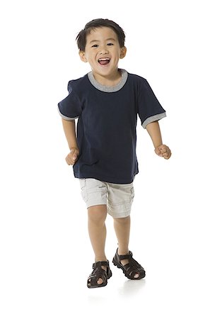 running child cut out - Running boy Stock Photo - Premium Royalty-Free, Code: 640-02769426