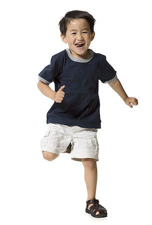 running child cut out - Running boy Stock Photo - Premium Royalty-Free, Code: 640-02769427