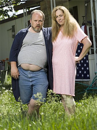 redneck facial hair - Overweight couple in a trailer park Stock Photo - Premium Royalty-Free, Code: 640-02769442