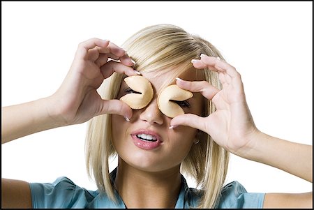 Woman with fortune cookies Foto de stock - Royalty Free Premium, Número: 640-02769686