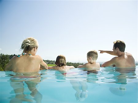 Family in infinity pool Foto de stock - Sin royalties Premium, Código: 640-02769715