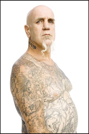 face man tatoo - Heavily tattooed man Stock Photo - Premium Royalty-Free, Code: 640-02769778