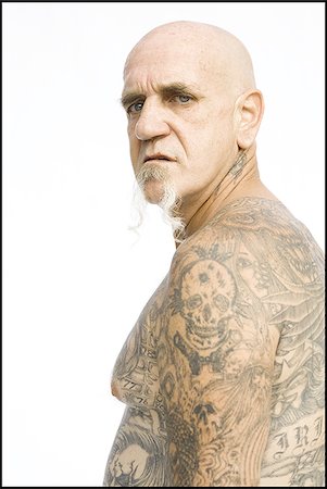 face man tatoo - Heavily tattooed man Stock Photo - Premium Royalty-Free, Code: 640-02769779