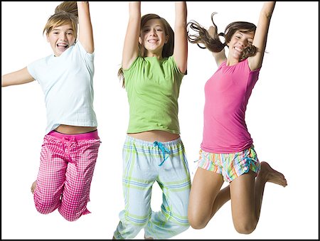 Three girls jumping Stock Photo - Premium Royalty-Free, Code: 640-02769838