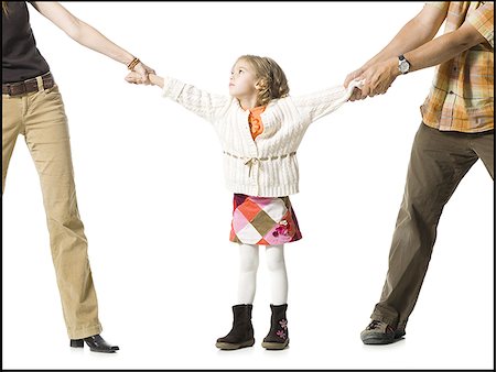 Unhappy young girl in custody battle Stock Photo - Premium Royalty-Free, Code: 640-02769831