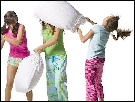 simsearch:640-02769656,k - Three girls pillow fighting Foto de stock - Sin royalties Premium, Código: 640-02769842