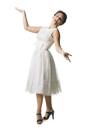 simsearch:640-01355807,k - Woman in white dress gesturing Foto de stock - Sin royalties Premium, Código: 640-02769855