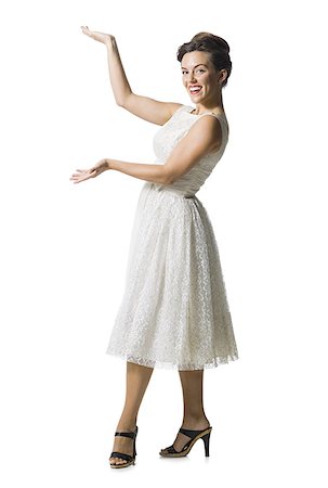 simsearch:640-01355807,k - Woman in white dress gesturing Stock Photo - Premium Royalty-Free, Code: 640-02769856