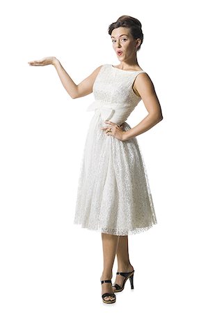 simsearch:640-01355807,k - Woman in white dress gesturing Foto de stock - Sin royalties Premium, Código: 640-02769857