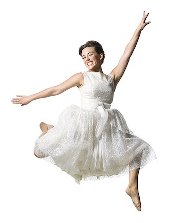 simsearch:640-01355807,k - Woman in white dress jumping Foto de stock - Sin royalties Premium, Código: 640-02769876