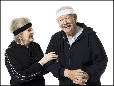 senior couple eye contact head and shoulders not indoors - Senior couple in track suits Stock Photo - Premium Royalty-Free, Code: 640-02769969