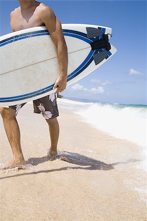 simsearch:640-02773714,k - Man walking with surfboard Foto de stock - Sin royalties Premium, Código: 640-02774113
