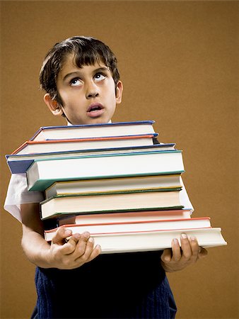 simsearch:640-02774365,k - Boy holding pile of textbooks Stock Photo - Premium Royalty-Free, Code: 640-02774606