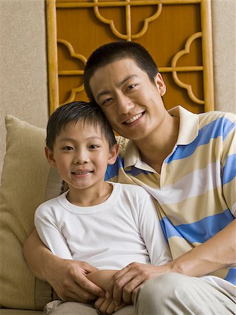 simsearch:640-01601434,k - Father and son smiling Stock Photo - Premium Royalty-Free, Code: 640-02775099