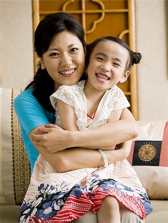 simsearch:640-01601434,k - Mother and daughter embracing and smiling Stock Photo - Premium Royalty-Free, Code: 640-02775114