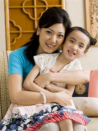 simsearch:640-01601665,k - Mother and daughter embracing and smiling Fotografie stock - Premium Royalty-Free, Codice: 640-02775115