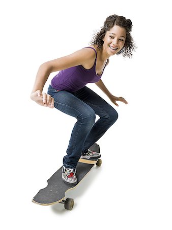 simsearch:640-02775275,k - Mädchen mit Zahnspange auf skateboard Stockbilder - Premium RF Lizenzfrei, Bildnummer: 640-02775268