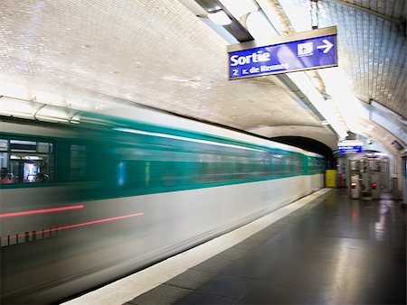 simsearch:640-02775824,k - Subway platform with subway in motion Stock Photo - Premium Royalty-Free, Code: 640-02775828