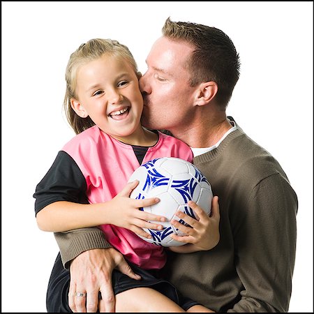 soccer dad - Father and daughter with soccer ball. Stock Photo - Premium Royalty-Free, Code: 640-02775988