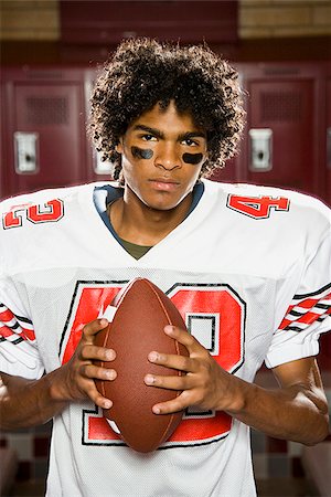 football locker room photography - High School football player. Stock Photo - Premium Royalty-Free, Code: 640-02776014