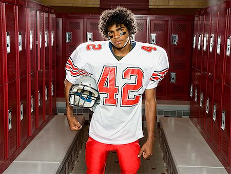 football locker room photography - High School football player. Stock Photo - Premium Royalty-Free, Code: 640-02776011