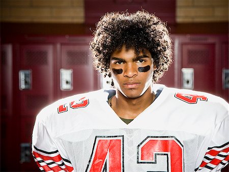 football locker room photography - High School football player. Stock Photo - Premium Royalty-Free, Code: 640-02776013