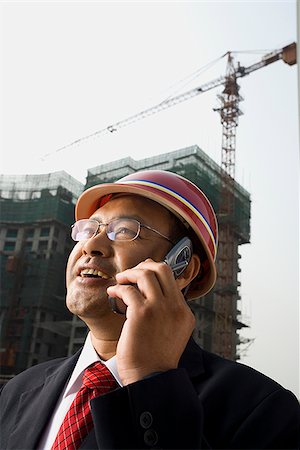 Architect on the job site. Stock Photo - Premium Royalty-Free, Code: 640-02776038