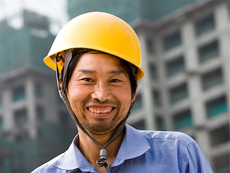 simsearch:640-02949616,k - A construction worker on the job site. Foto de stock - Royalty Free Premium, Número: 640-02776055