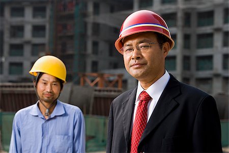 simsearch:640-02949616,k - Architect on the job site with a worker. Foto de stock - Royalty Free Premium, Número: 640-02776051