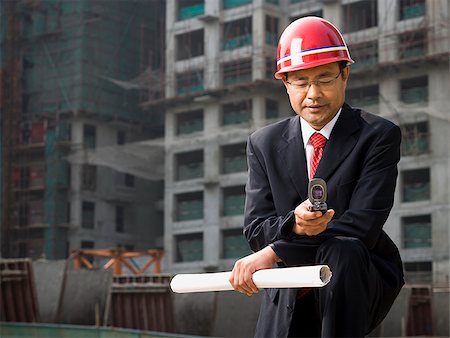 Architect on the job site. Stock Photo - Premium Royalty-Free, Code: 640-02776071