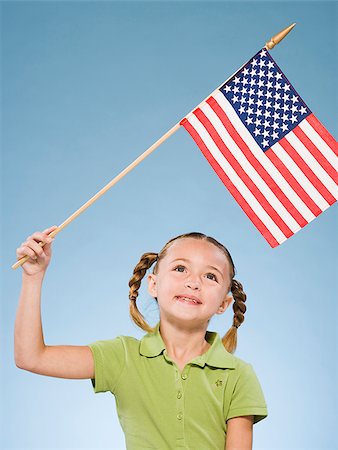 Child with American flag. Stock Photo - Premium Royalty-Free, Code: 640-02776088