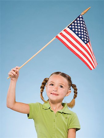 Child with American flag. Stock Photo - Premium Royalty-Free, Code: 640-02776089