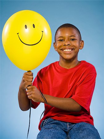 simsearch:640-02776114,k - Child holding a balloon. Stock Photo - Premium Royalty-Free, Code: 640-02776097
