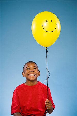 simsearch:640-02776114,k - Child holding a balloon. Stock Photo - Premium Royalty-Free, Code: 640-02776100