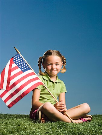 Child with American flag. Stock Photo - Premium Royalty-Free, Code: 640-02776150