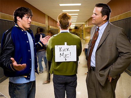 football players bullying nerds - High School Nerd. Stock Photo - Premium Royalty-Free, Code: 640-02776360