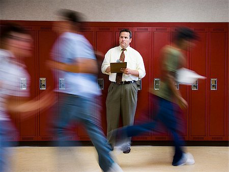 student running in the hallway - High School Principal. Stock Photo - Premium Royalty-Free, Code: 640-02776485