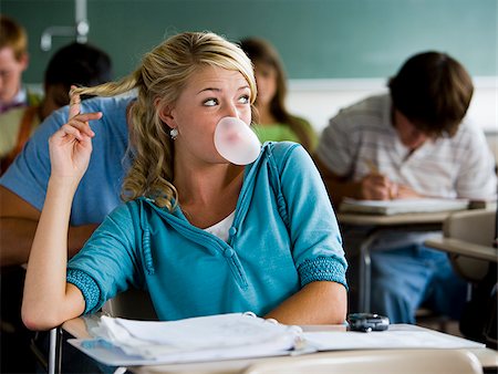 portrait chewing gum - Student in a classroom. Stock Photo - Premium Royalty-Free, Code: 640-02776559