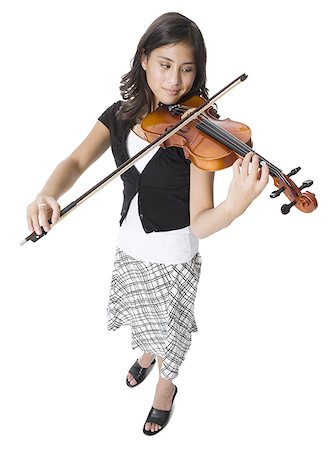 fiddler - A young woman plays the violin. Stock Photo - Premium Royalty-Free, Code: 640-02776646