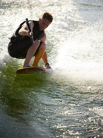 Man on a wakeboard. Stock Photo - Premium Royalty-Free, Code: 640-02776717