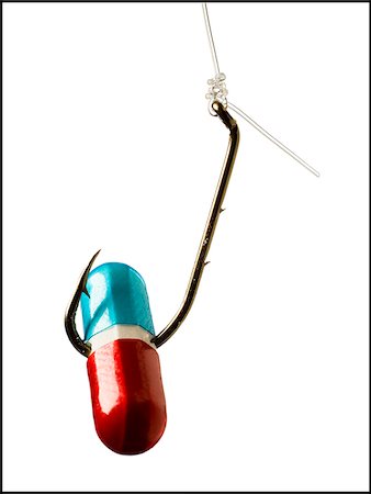 drug store not people - Pill on a fish hook. Stock Photo - Premium Royalty-Free, Code: 640-02776937