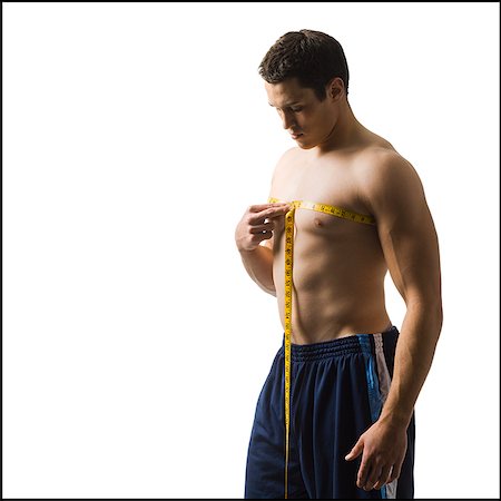 simsearch:640-02951020,k - Young man working out. Foto de stock - Royalty Free Premium, Número: 640-02777014