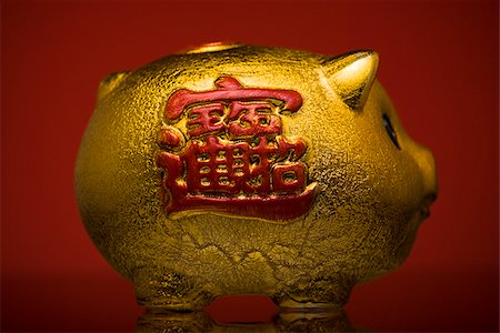 Golden piggy bank. Stock Photo - Premium Royalty-Free, Code: 640-02777019