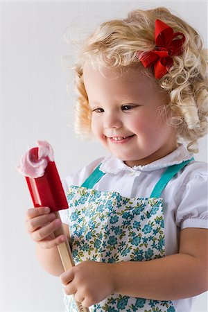 little girl with a spatula. Stock Photo - Premium Royalty-Free, Code: 640-02777368