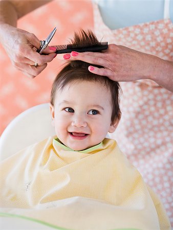 scissors and hair cut women - Baby getting a haircut. Stock Photo - Premium Royalty-Free, Code: 640-02777371